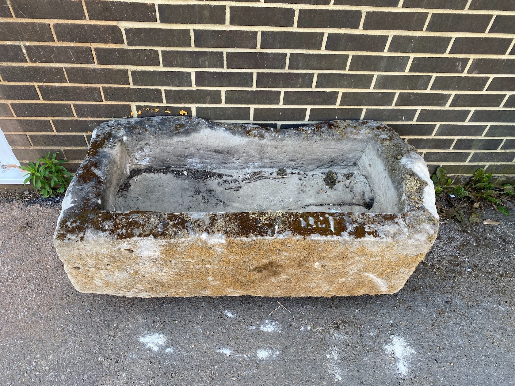 A large rectangular stone trough, length 117cm, depth 61cm, height 36cm